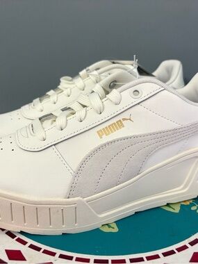 Puma White Sneakers with Gold Logo Accent